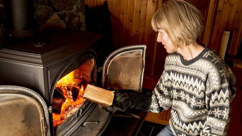 lighting a wood stove